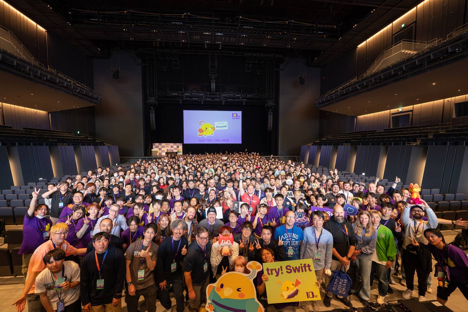 Group photo of try! Swift Tokyo 2026 attendees gathered in the hall